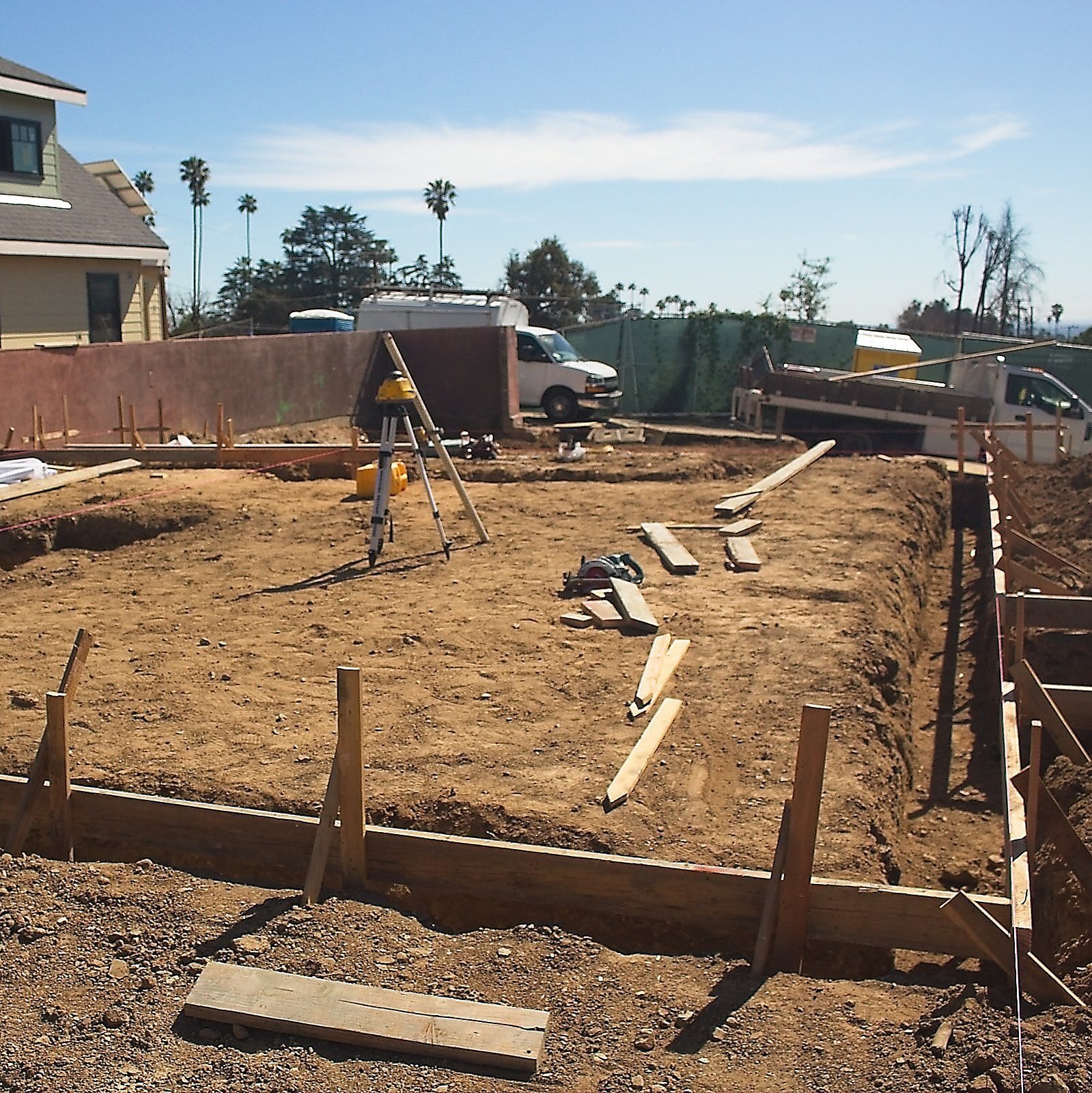 Engineered retaining wall and site work