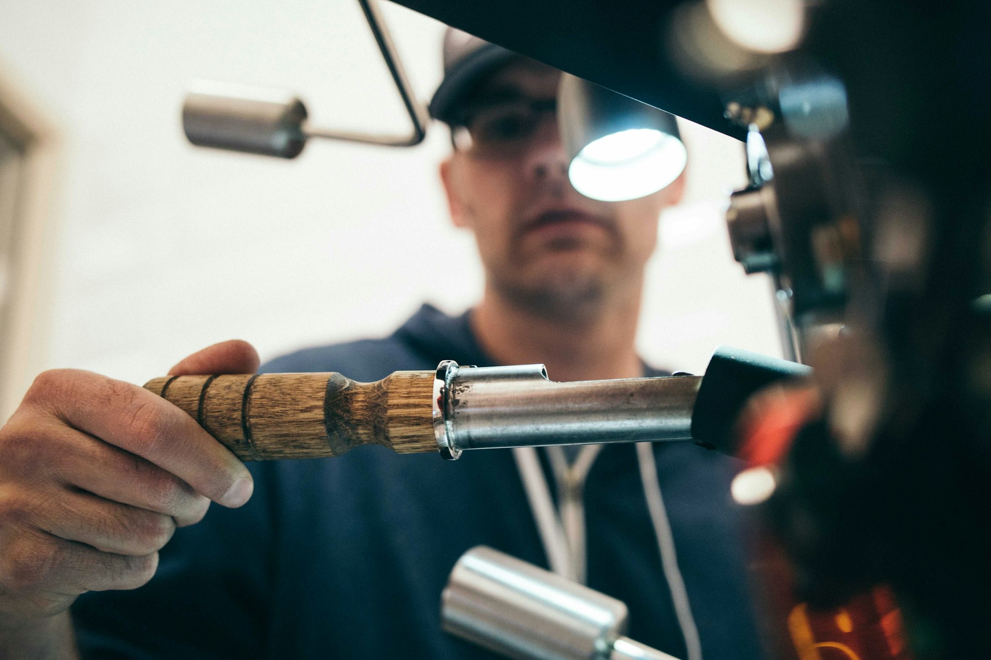 Technician servicing mechanical HVAC equipment